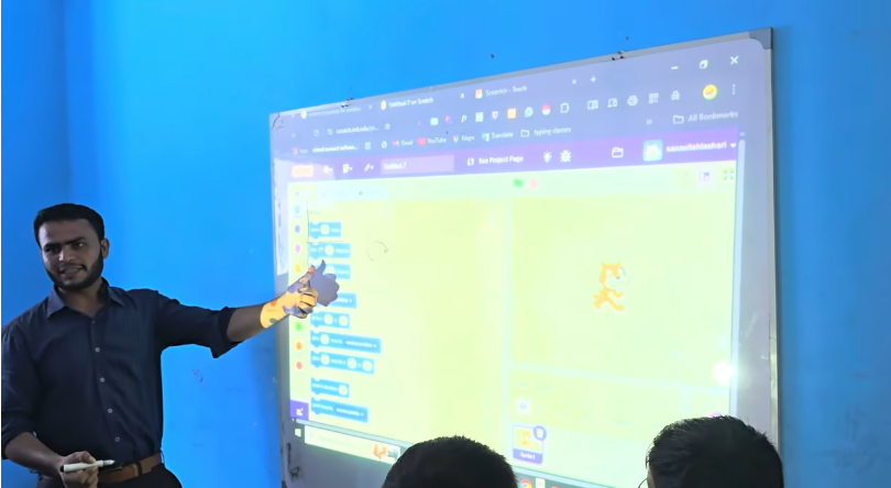 me teaching scratch programming .png